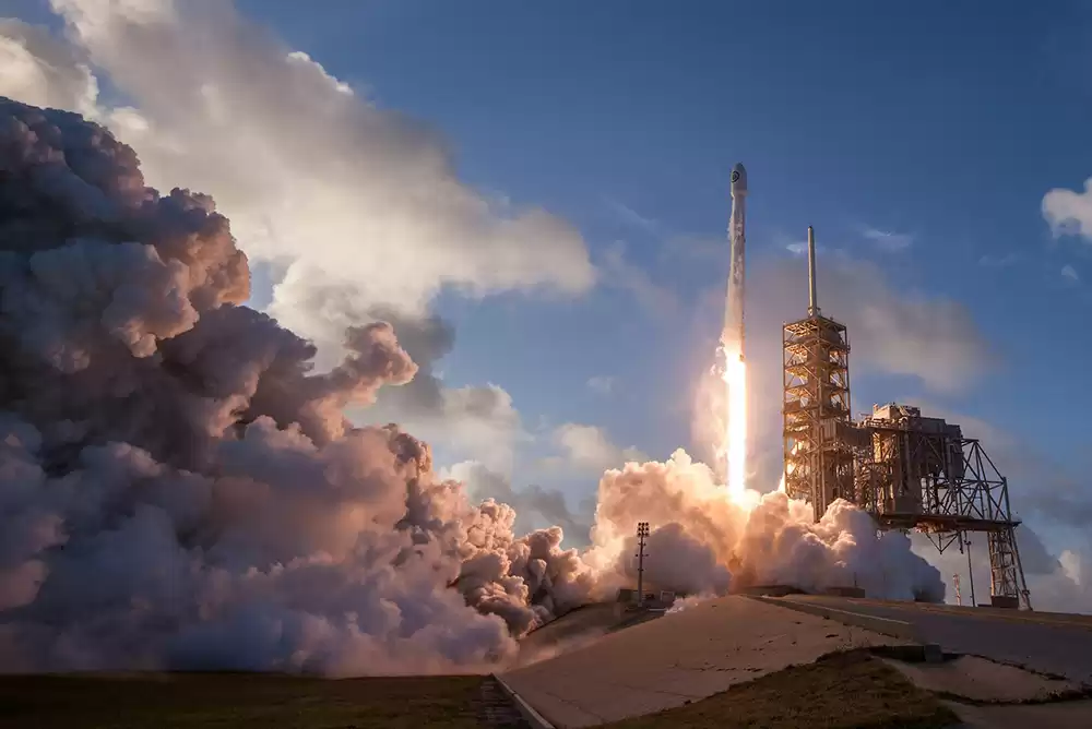 A spacecraft with aeroglaze coatings about to lift off